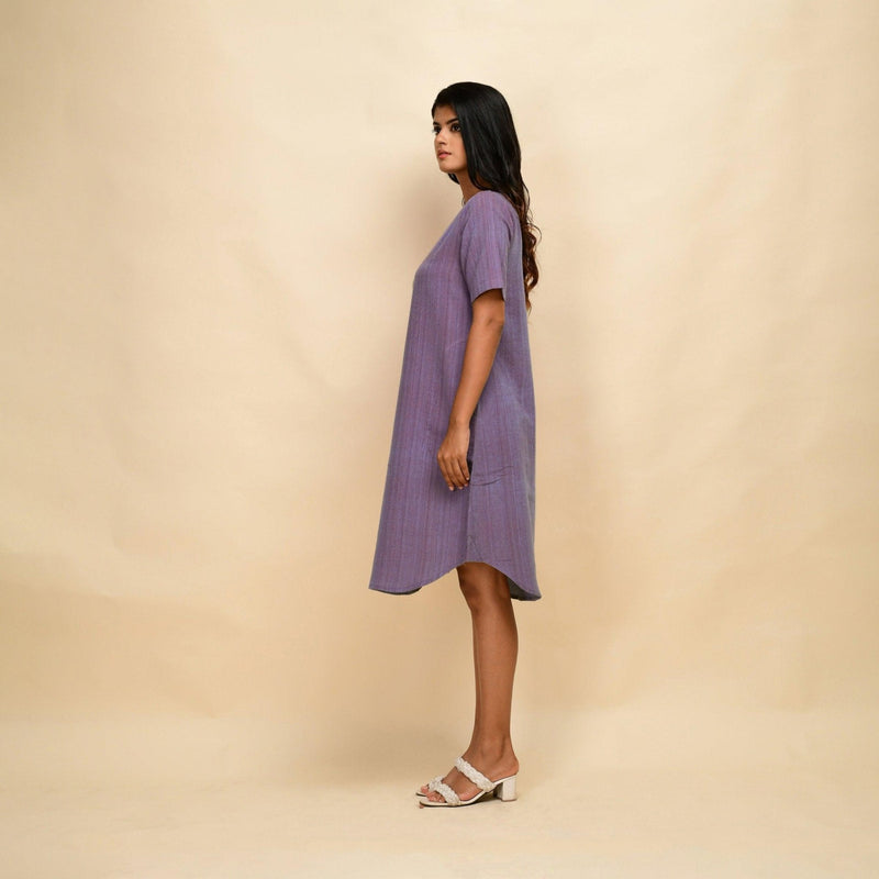 Left View of a Model wearing Lilac 100% Cotton Khadi Knee Length Dress