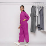 Left View of a Model wearing Magenta 100% Linen High Neck Jumpsuit