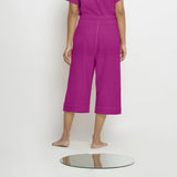 Back View of a Model wearing Magenta 100% Linen Loose Fit Mid-Rise Culottes