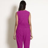 Back View of a Model wearing Magenta 100% Linen V-Neck Frilled Godet Top