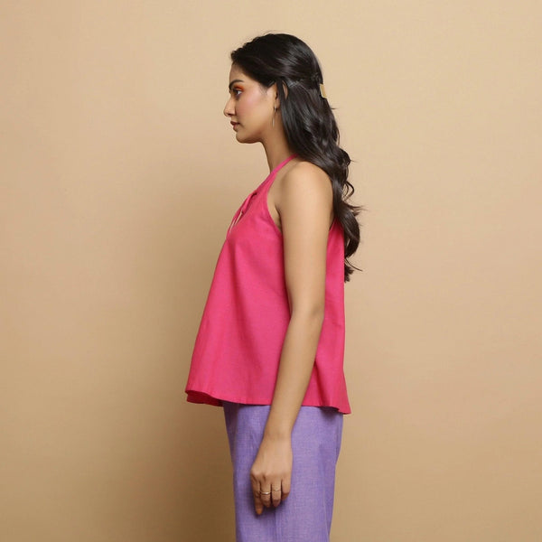 Left View of a Model wearing Magenta Hand-Embroidered Flared Top