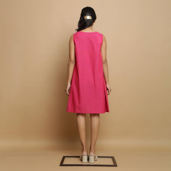 Back View of a Model wearing Magenta Hand-Embroidered Godet Dress