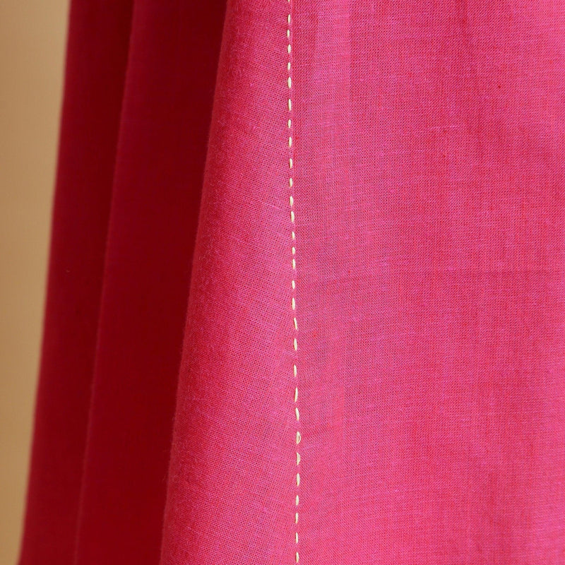 Close View of a Model wearing Magenta Hand-Embroidered Godet Dress