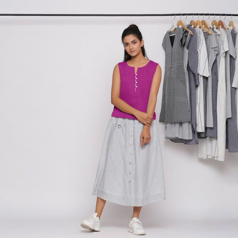 Front View of a Model wearing Magenta Linen Split Neck Button-Down Sleeveless Top