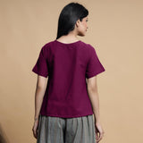 Back View of a Model wearing Magenta Pleated Neck A-Line Top