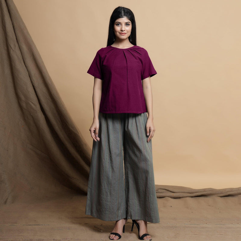 Front View of a Model wearing Magenta Pleated Neck A-Line Top