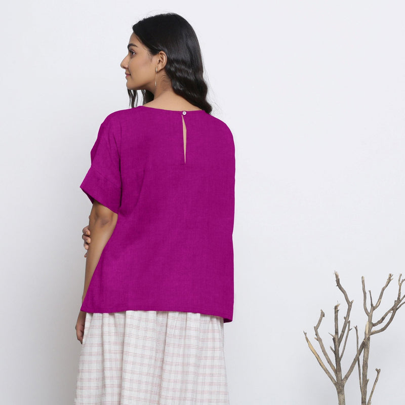 Back View of a Model wearing Magenta Round Neck Linen Loose Gathered Yoke Top