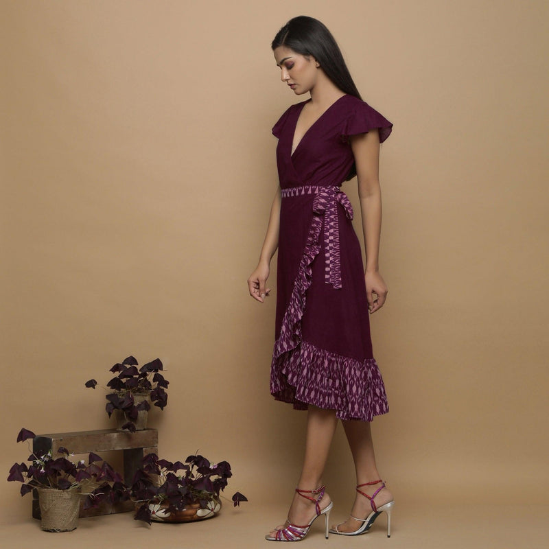 Left View of a Model wearing Maroon Handspun Cotton Asymmetrical Midi Wrap Dress