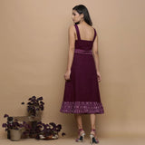 Back View of a Model wearing Maroon Handspun Cotton Muslin Boat Neck Tier Midi Dress