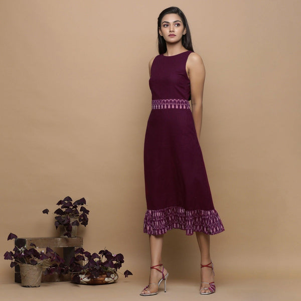 Left View of a Model wearing Maroon Handspun Cotton Muslin Boat Neck Tier Midi Dress