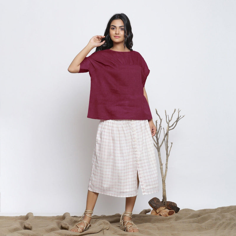 Front View of a Model wearing Handspun Maroon Yoked Top