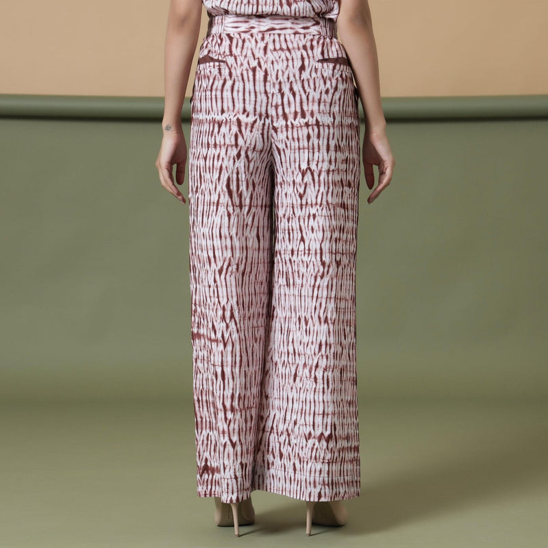 Back View of a Model wearing Maroon Shibori Tie-Dye Cotton Elasticated Wide Legged Pant