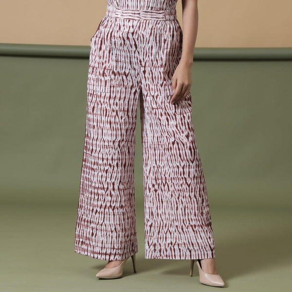 Front View of a Model wearing Maroon Shibori Tie-Dye Cotton Elasticated Wide Legged Pant