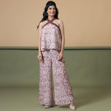 Front View of a Model wearing Maroon Shibori Tie-Dye Cotton Elasticated Wide Legged Pant