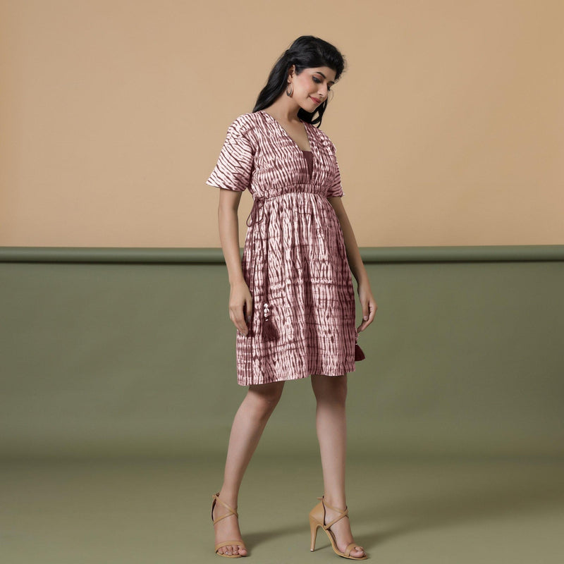 Right View of a Model wearing Maroon Shibori Drop Shoulder Dress