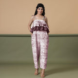 Front View of a Model wearing Maroon Shibori Frilled Camisole Jumpsuit