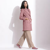 Right View of a Model wearing Mauve Cotton Corduroy Long Coat