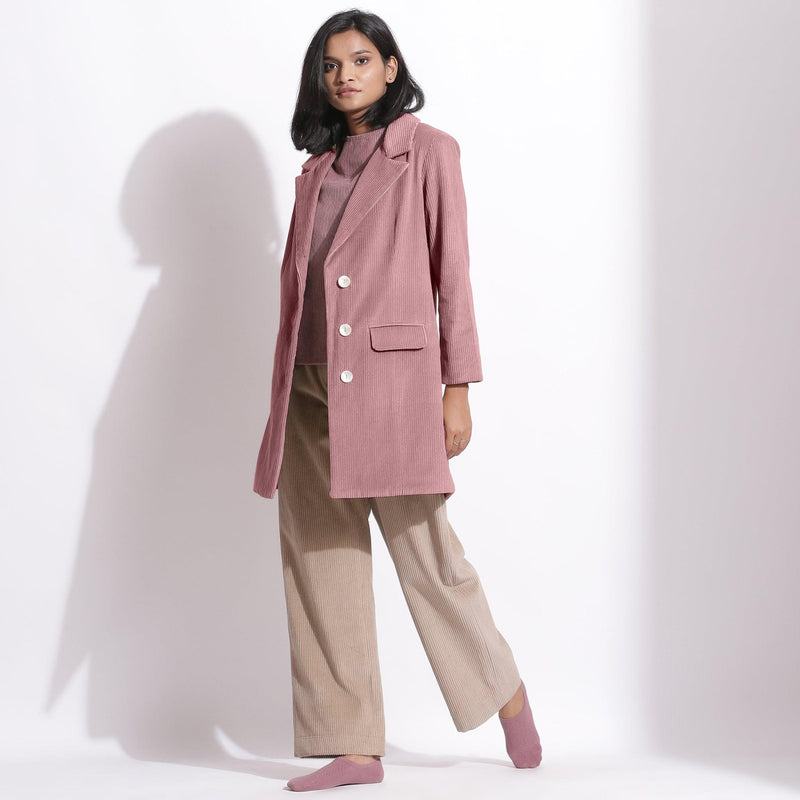 Left View of a Model wearing Mauve Cotton Corduroy Long Coat