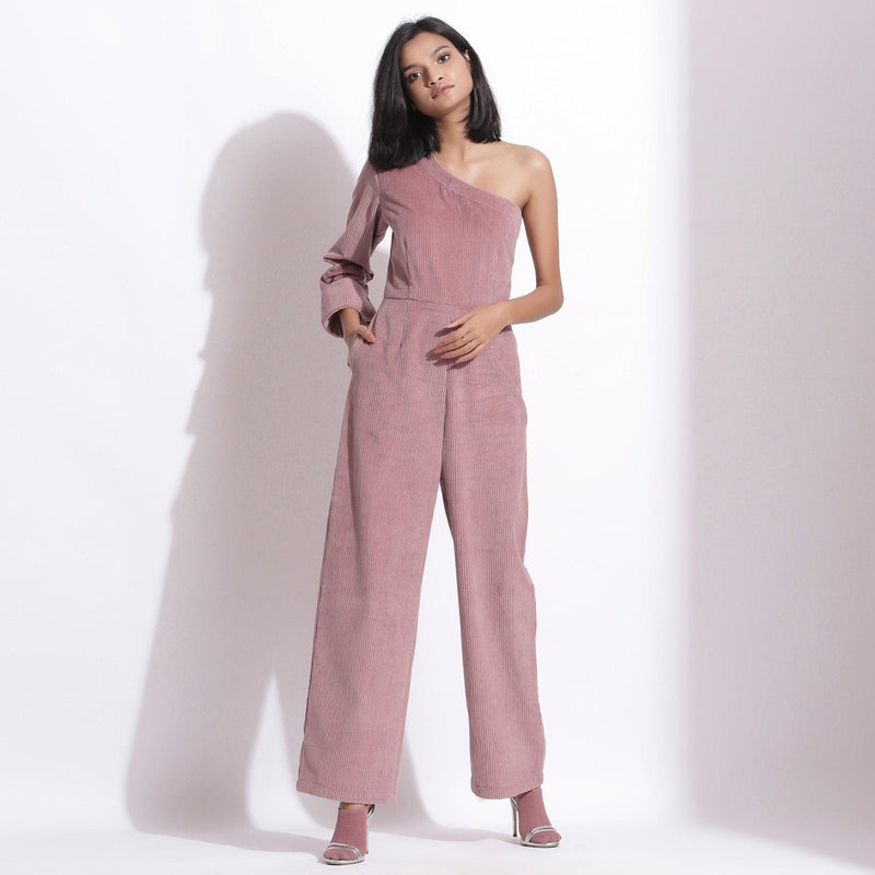 Front View of a Model wearing Mauve Corduroy One-Shoulder Jumpsuit