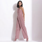 Left View of a Model wearing Mauve Corduroy One-Shoulder Jumpsuit