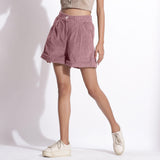 Front View of a Model wearing Mauve Cotton Corduroy Baggy Shorts