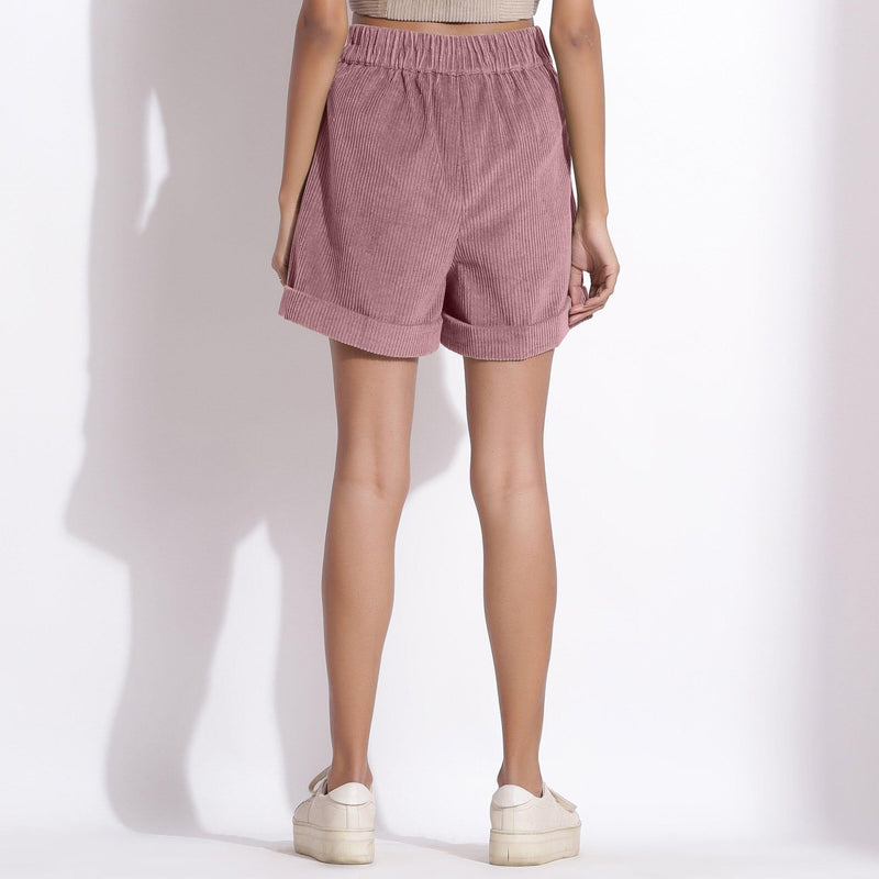 Back View of a Model wearing Mauve Cotton Corduroy Baggy Shorts