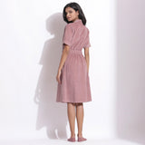 Back View of a Model wearing Cotton Corduroy Mauve Coat Dress