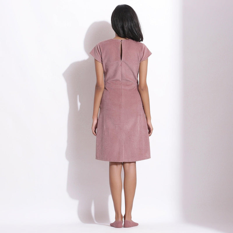 Back View of a Model wearing Mauve Cotton Corduroy V-Neck Dress