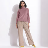 Front View of a Model wearing Mauve Corduroy High Neck Top