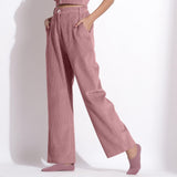 Left View of a Model wearing Mauve Corduroy Wide-Legged Trouser Pants