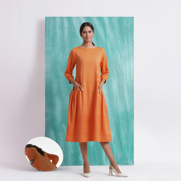 Front View of a Model wearing Melon Orange Comfort Fit Mirror Work Dress