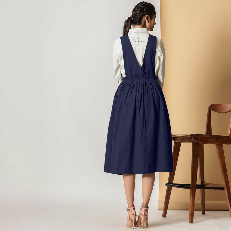 Back View of a Model wearing Midnight Blue Cotton Flax Pinafore Midi Wrap Dress