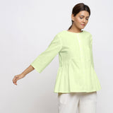 Right View of a Model wearing Mint Green Cotton Button-Down Top