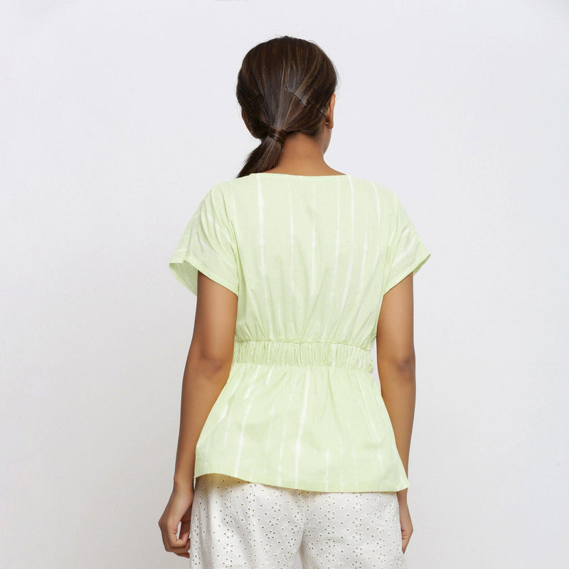 Back View of a Model wearing Mint Green Hand Tie Dye Blouson Top