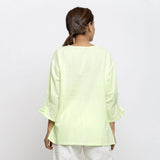 Back View of a Model wearing Mint Green Hand Tie Dyed Cotton Top