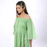 Front Detail of a Model wearing Handspun Mint Green Off-Shoulder Dress