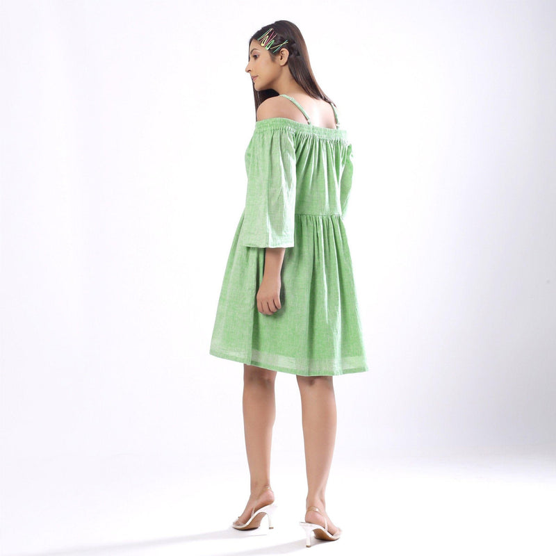 Back View of a Model wearing Handspun Mint Green Off-Shoulder Dress