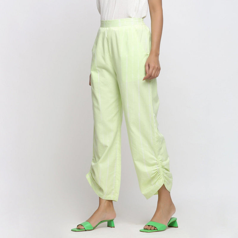 Left View of a Model wearing Mint Green Tie And Dye Straight Pant