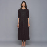 Front View of a Model wearing Moonlight Black Cotton Flannel Gathered Dress