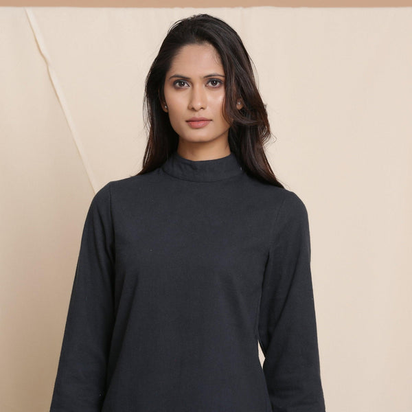 Front View of a Model wearing Moonlight Black Warm Cotton Flannel High Neck Top