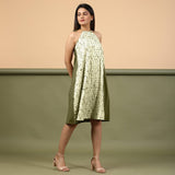 Right View of a Model wearing Olive Green Shibori Halter Neck A line Dress