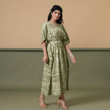 Right View of a Model wearing Light Green Shibori Kaftan Dress