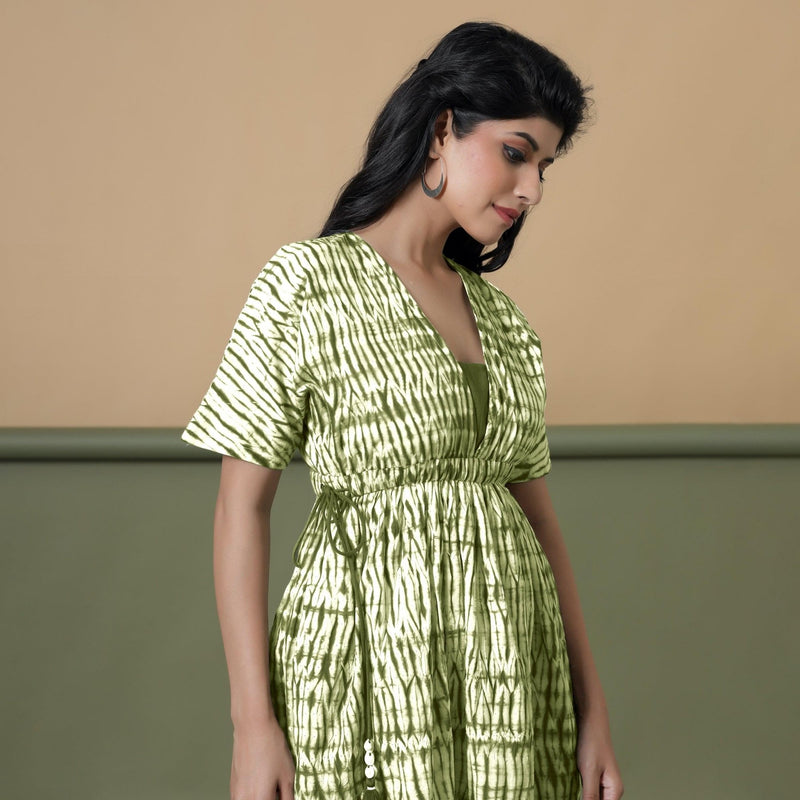 Right View of a Model wearing Olive Green Shibori Drop Shoulder Dress