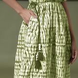 Front Detail of a Model wearing Olive Green Shibori Drop Shoulder Dress