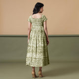 Back View of a Model wearing Olive Green Shibori Elasticated Gathered Dress