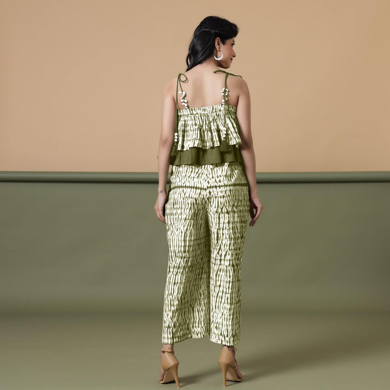 Back View of a Model wearing Olive Green Shibori Frilled Camisole Jumpsuit