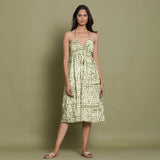 Front View of a Model wearing Olive Green Shibori Halter Neck Gathered Dress