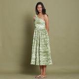 Left View of a Model wearing Olive Green Shibori One-Shoulder Midi Dress