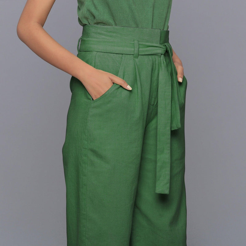 Right Detail of a Model wearing Moss Green Cotton Corduroy Pant