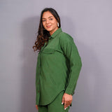 Left View of a Model wearing Moss Green Warm Cotton Corduroy Button-Down Shacket